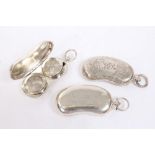 Three Edwardian silver sovereign cases of kidney form,