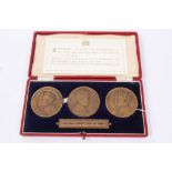 Three 1936 Royal Commemorative bronze medallions in case 'The Three English Kings of 1936',