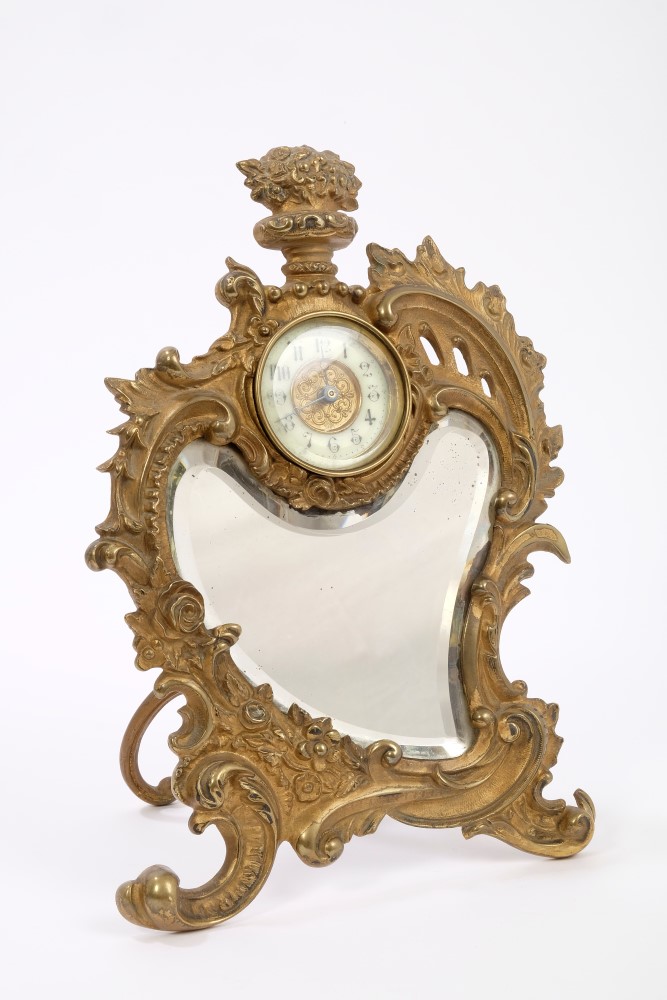 Late 19th century French gilt metal 'strut' clock with rococo scroll and bevelled mirrored panel, - Image 3 of 4