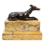 Antique bronze sculpture of a reclining greyhound, raised on variegated mustard marble plinth,