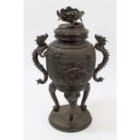 Late 19th century Japanese bronze urn and cover, the cover with chrysanthemum finial,