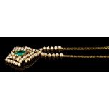 Art Deco-style emerald and diamond pendant necklace with a marquise cut emerald estimated to weigh