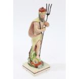 Early 19th century Staffordshire pearlware figure after Ralph Wood, of Neptune holding a trident,