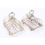 Matched pair of George IV / Victorian silver six-division toast racks with looped frames,