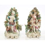 Pair late 18th century Derby porcelain figures of a warrior in armour with cockerel and floral
