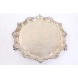 George IV silver salver of hexagonal form, with deep piecrust border, shell and scroll edge, scroll,