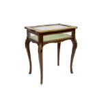 Victorian-style mahogany and gilt metal mounted bijouterie table of serpentine form,