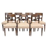 Set of seven Regency mahogany dining chairs, each with bar back and shell carved horizontal splat,