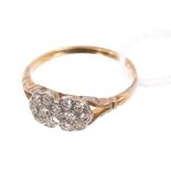 1930s diamond ring with a double flower cluster of single cut diamonds with pierced gallery,