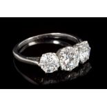 Fine diamond three-stone ring, with three brilliant cut diamonds in claw setting,