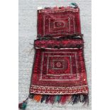 North African carved bag - concentric square ornament on brick-red ground,