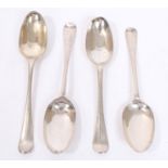 Four early 18th century silver Hanoverian rattail spoons with engraved crest or initials (various