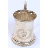 19th century American silver mug of waisted form, with foliate borders,