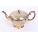 Victorian silver teapot of melon form, with chased and engraved scroll and foliate decoration,