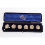 Set of six silver buttons with tulip decoration in the Art Nouveau style,