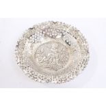 Victorian silver bonbon dish of circular form, with pierced border and scroll and floral rim,