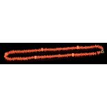 19th century carved coral necklace with pineapple cut coral bead spacers and carved links,