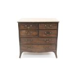 George III chest, having four short over two long drawers, on splayed bracket feet,