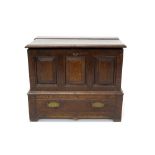 Mid-18th century oak coffer bach with hinged moulded lid and triple panel front over long drawer,
