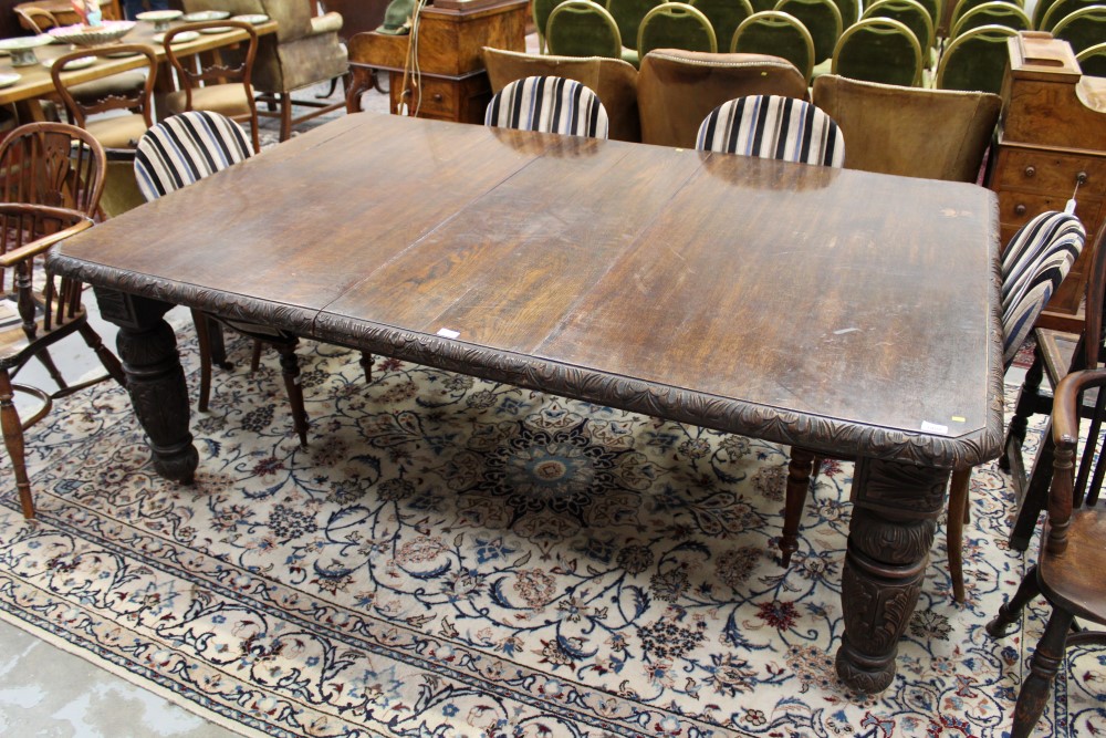 Victorian carved oak extending dining table, the rounded rectangular top with acanthus carved edge,