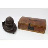 19th century steel inkwell in the form of a knights' helmet, on shield-shaped base,