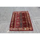 Sozani rug with multiple rows of floral motifs,