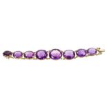 Victorian-style amethyst bracelet with eight large oval mixed cut amethysts in Continental silver
