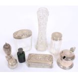 Selection of Victorian and early 20th century silver - including four silver-topped toilet bottles,