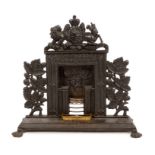 19th century salesmen's miniature cast iron fireplace and surround with cast Georgian Royal Coat of