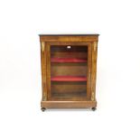 Victorian walnut and line-inlaid pier cabinet enclosed by glazed door, on plinth base,