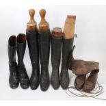 Two pairs of ladies' black leather hunting boots with wooden trees, one pair retailed by Peel & Co.