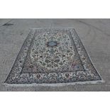 Large Tabriz rug - cream ground with arabesque ornament in multiple meander borders,