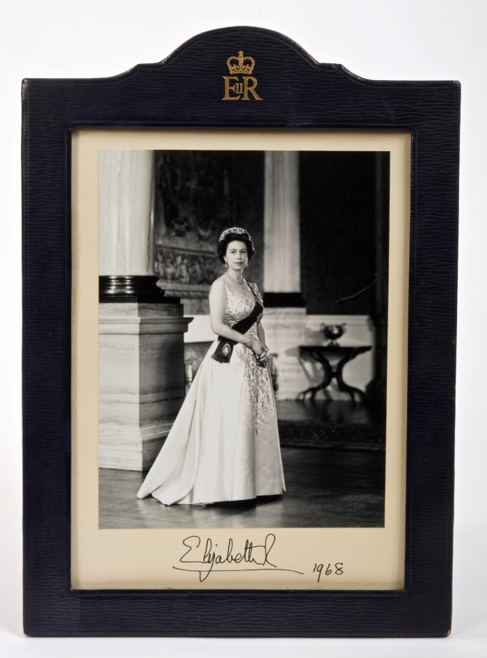 HM Queen Elizabeth II - fine Royal Presentation signed portrait photograph of The Queen wearing a