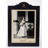 HM Queen Elizabeth II - fine Royal Presentation signed portrait photograph of The Queen wearing a