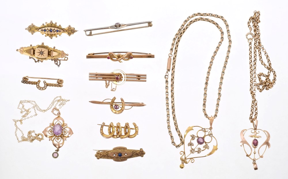 Three Edwardian gold and gem set pendants on chains and nine Victorian and Edwardian gold bar