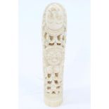 19th century Indonesian carved ivory knife handle intricately carved with demons,