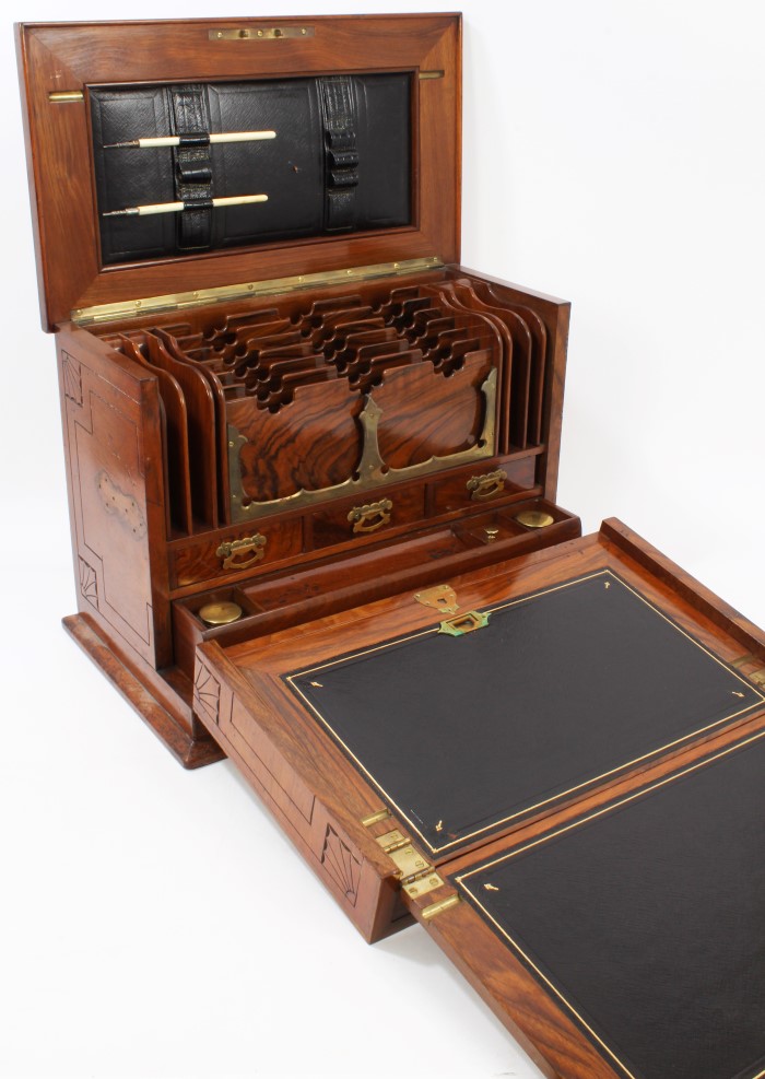 Good quality late 19th century walnut writing box with carved domed hinged cover and floral