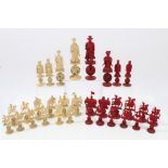 Mid-19th century composite Chinese export red stained and natural carved figural chess set on