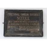 Early 20th century painted sign inscribed - Bethnal Green Estate, framed,