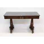 19th century Continental mahogany writing table with rounded rectangular leather inset top and