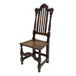 Rare mid-17th century oak side chair with arched scroll carved top rail and vertical splat back,