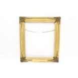 19th century gilt gesso frame - swept form, with rococo detail to corners,