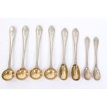 Set of eight Victorian silver condiment spoons with bead decoration and engraved reef knot crest -