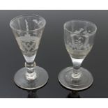 Two Georgian toasting-type glasses - one engraved with Masonic symbols,