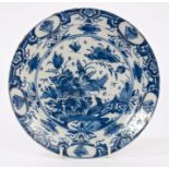 18th century Dutch Delft blue and white plate with Chinese-style bird and floral decoration,