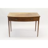 Regency mahogany bow front side table with single drawer, raised on square tapered legs,