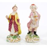 Pair late 18th / early 19th century Derby figures of a Turk and wife wearing turbans and holding