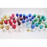 Collection of 19th century tinted glass wines - including ruby, green,