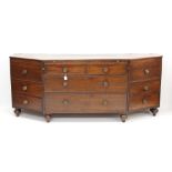 Unusual early 19th century sideboard of trapezoidal form,