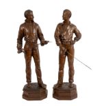 Pair late 19th century French carved wooden figures of swordsmen preparing for a duel 'Affaire